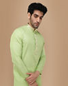 alt message - Manyavar Men Light Green Solid Kurta Set image number 0